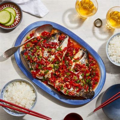  Spicy Steamed Fish Head with Pickled Cabbage – A Symphony of Tangy Spices and Silky Smooth Fish