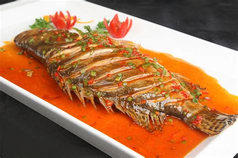  Stinky Mandarin Fish: An Aromatic Symphony of Fermented Flavors and Silky Smooth Textures!