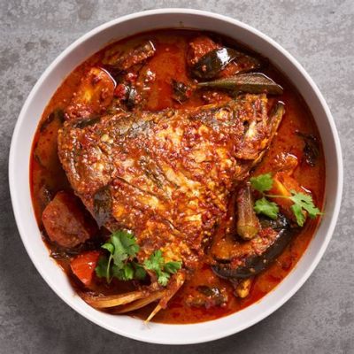  Sweet and Sour Fish Head Curry – An Aromatic Fiesta of Spicy and Tangy Flavors!